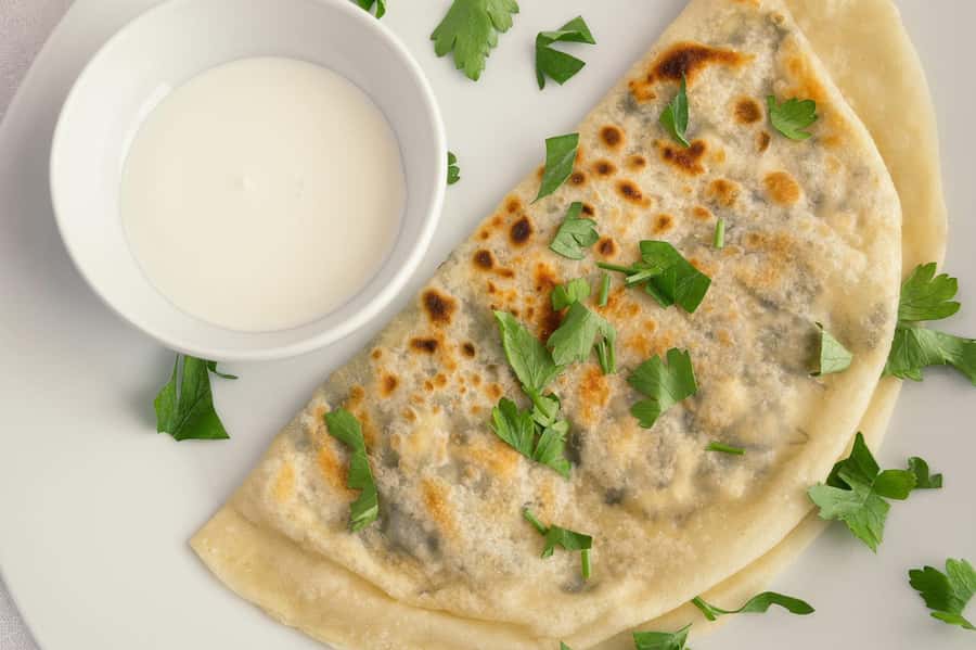 Azerbaijani Cooking Class & Old City Tour & Lunch - Making qutab and mixing mint ayran