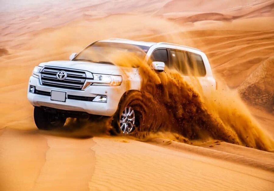 Dubai: Desert Safari, Camel Ride, Quad Bike & BBQ Dinner - A 4x4 ride sets up the desert adventure