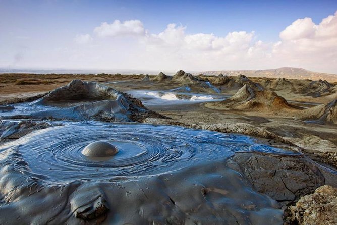 Mud Volcanoes & Gobustan tour (Group & Private) - What the guide adds to the experience